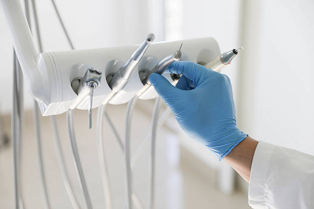 Professional Tooth Extraction technician working in Valley City, ND